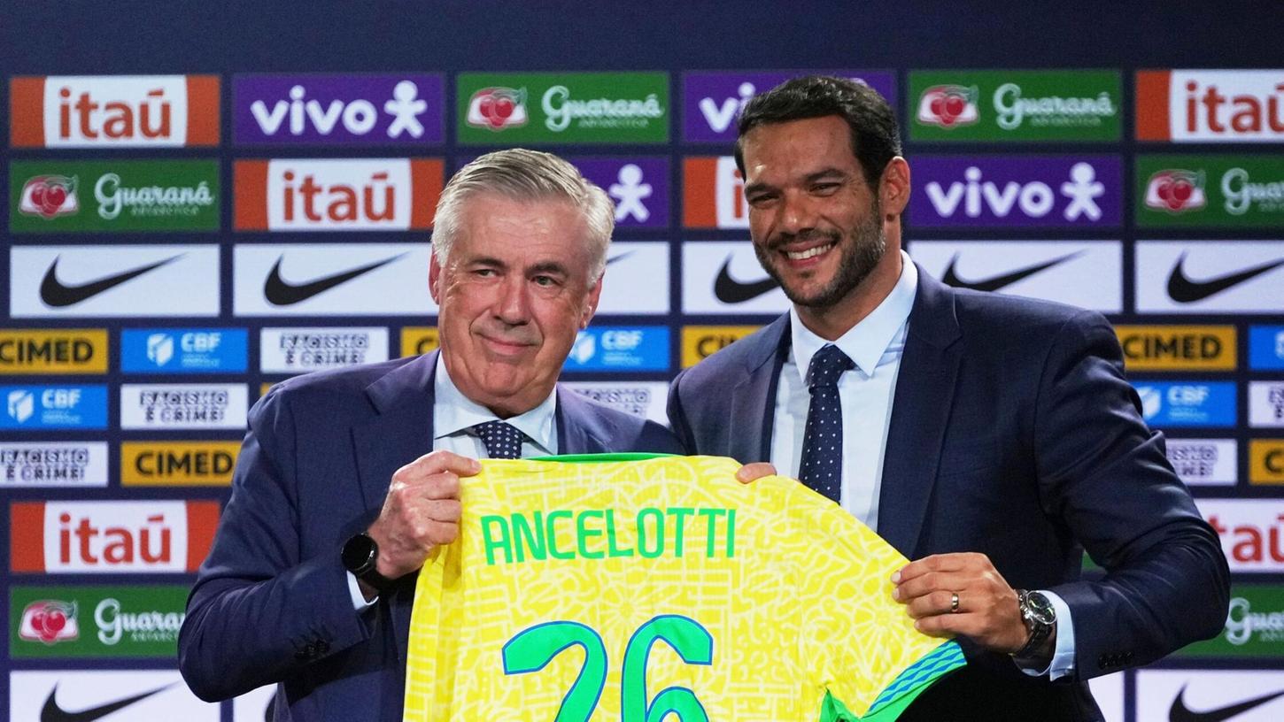 Der brasilianische Fußballverband muss den Einsatz eines nicht lizenzierten Beraters bei der Verpflichtung von Nationaltrainer Carlo Ancelotti (l) erklären. (Archivbild) Der brasilianische Fußballverband muss den Einsatz eines nicht lizenzierten Beraters bei der Verpflichtung von Nationaltrainer Carlo Ancelotti (l) erklären. (Archivbild)