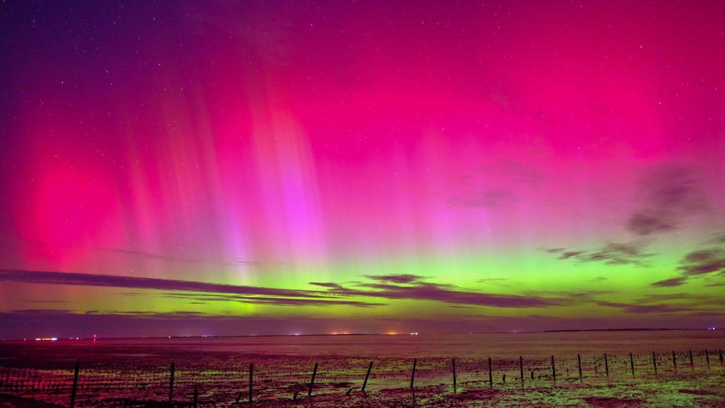 Polarlichter sind am Himmel über Schillig (Kreis Friesland) zu sehen. (Symbolbild) Polarlichter sind am Himmel über Schillig (Kreis Friesland) zu sehen. (Symbolbild)