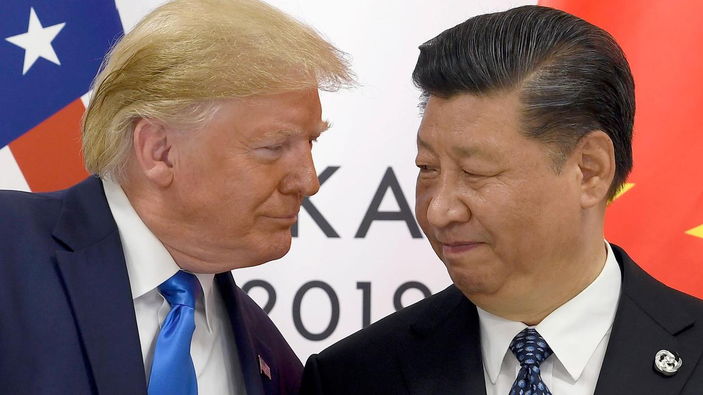 Inmitten des schweren Handelskonflikts zwischen den USA und China haben Donald Trump und Xi Jinping (r) miteinander telefoniert. (Archivbild) Inmitten des schweren Handelskonflikts zwischen den USA und China haben Donald Trump und Xi Jinping (r) miteinander telefoniert. (Archivbild)