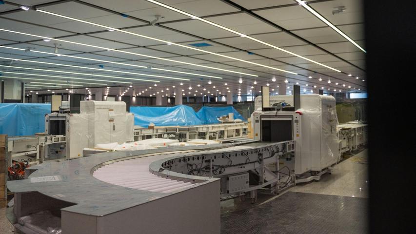 Die künftige Handgepäckskontrolle im Erweiterungsbau des Terminal 1 am Münchner Flughafen. Die künftige Handgepäckskontrolle im Erweiterungsbau des Terminal 1 am Münchner Flughafen.