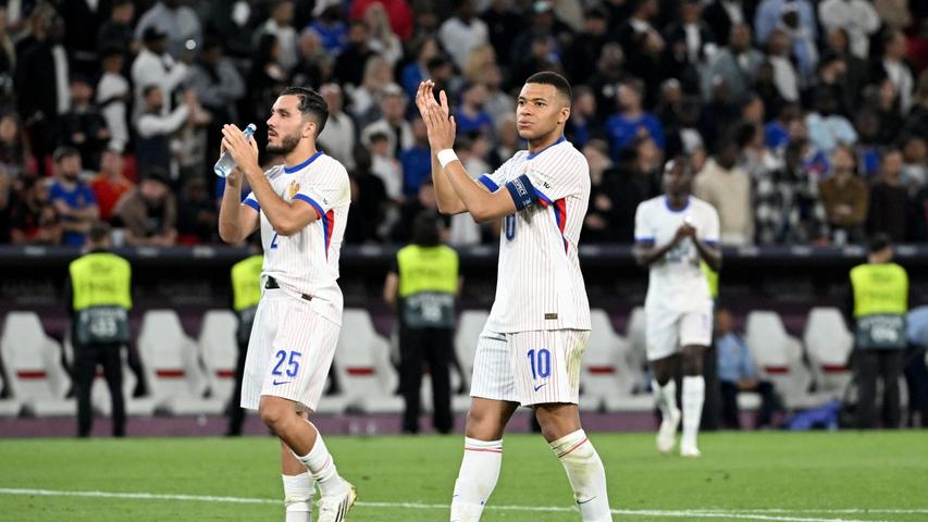 Knapp geschlagen: Die Franzosen um Superstar Kylian Mbappé (r.). Knapp geschlagen: Die Franzosen um Superstar Kylian Mbappé (r.).