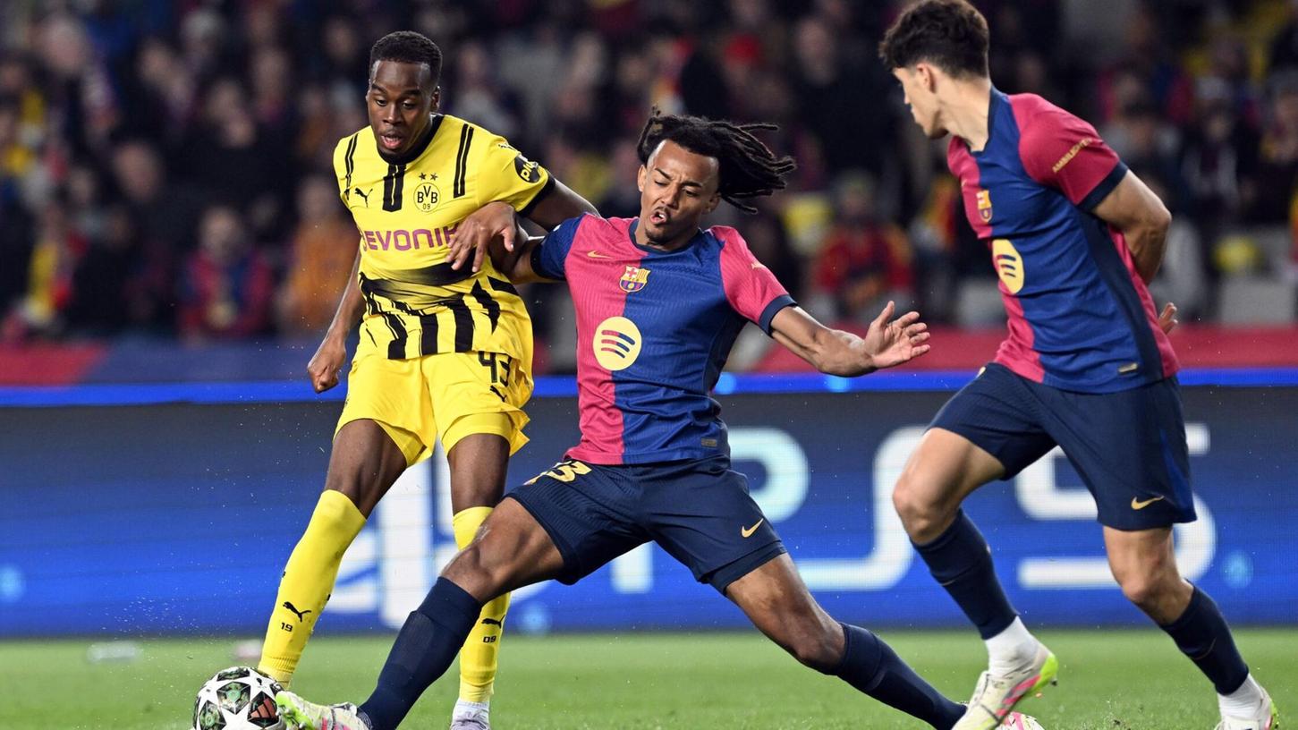 Jamie Gittens (l) könnte aus Dortmund zum FC Chelsea wechseln. Jamie Gittens (l) könnte aus Dortmund zum FC Chelsea wechseln.