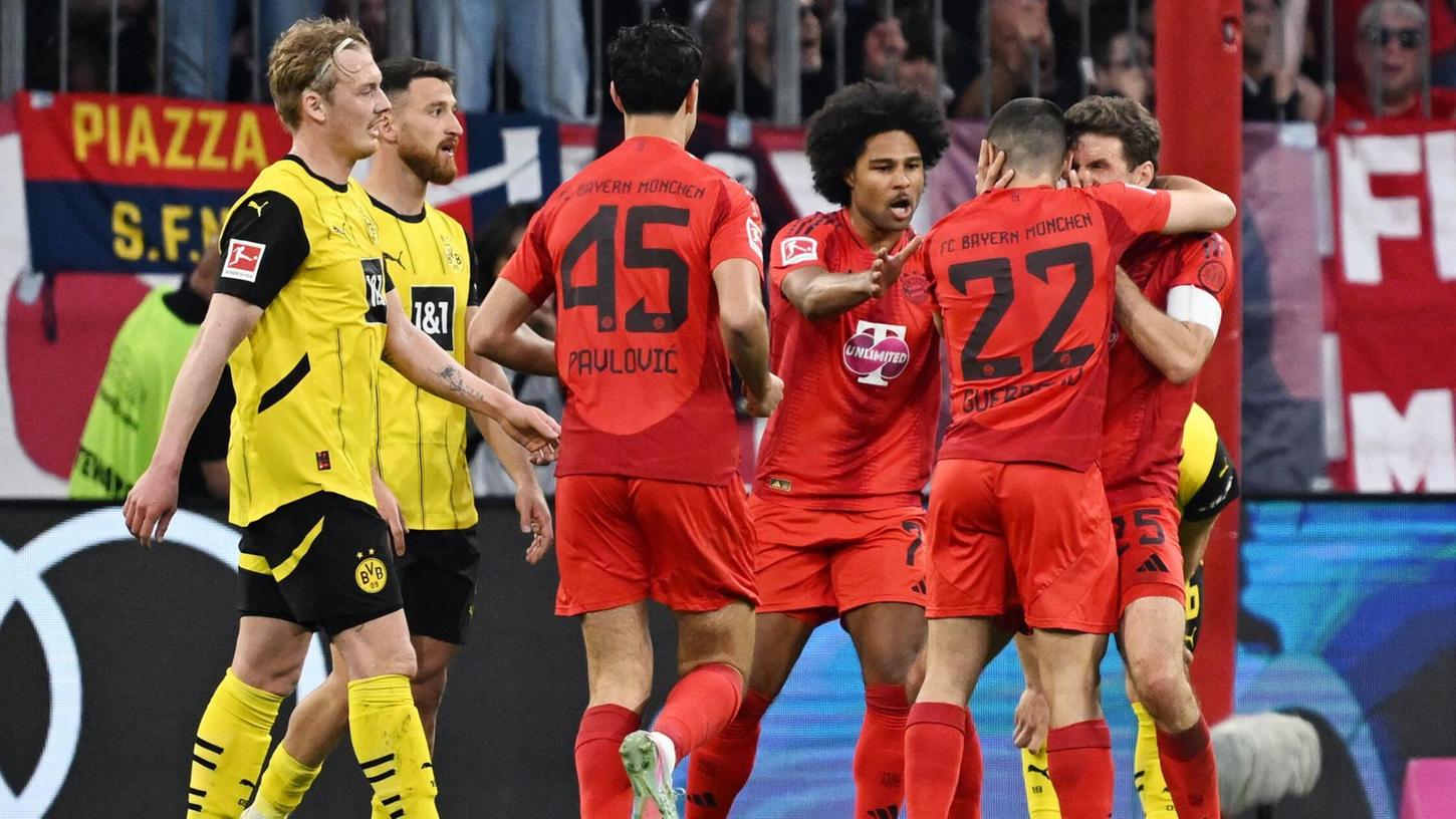 Das war für viele Fans noch okay: Vergangene Saison lief Bayern in schlichten roten Shirts mit dunklen Details auf. Dortmund trug klassisch gelbe Trikots, dazu dünne schwarze Streifen. Die neuen Designs beider Klubs stoßen bei den Fans nun auf ganz wenig Gegenliebe. Das war für viele Fans noch okay: Vergangene Saison lief Bayern in schlichten roten Shirts mit dunklen Details auf. Dortmund trug klassisch gelbe Trikots, dazu dünne schwarze Streifen. Die neuen Designs beider Klubs stoßen bei den Fans nun auf ganz wenig Gegenliebe.
