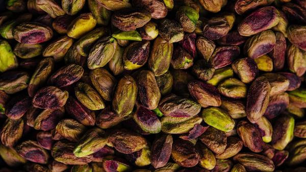 Pistachio nuts background close up