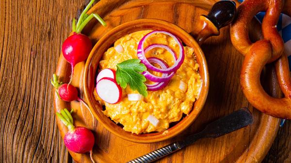 rustic Bavarian obazda with radishes and onions, r