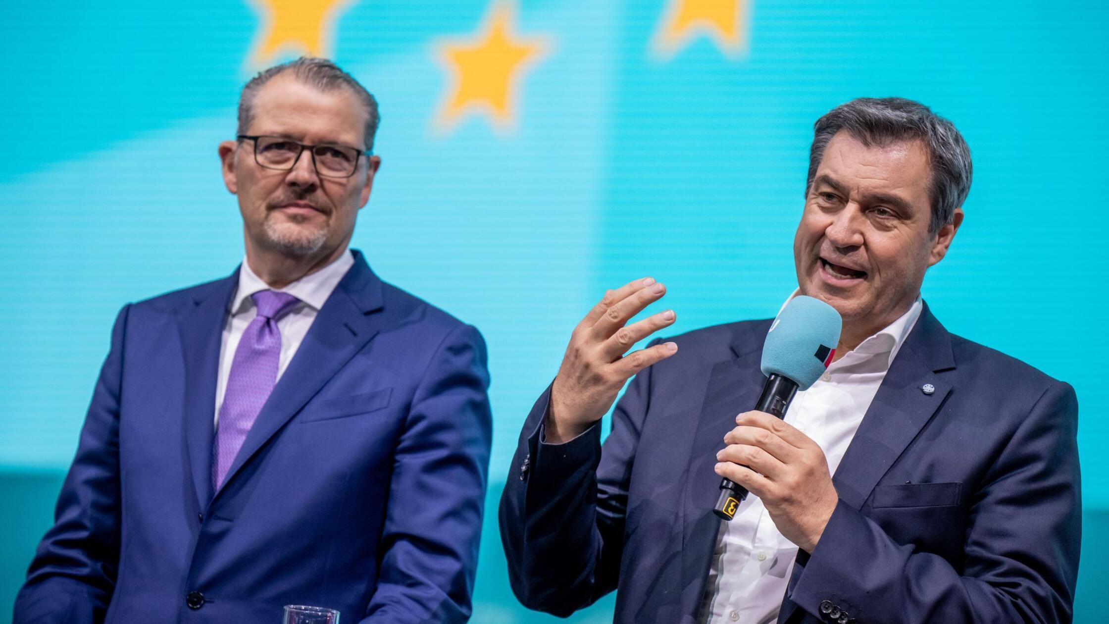 Markus Söder (CSU, r), Ministerpräsident von Bayer