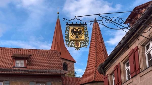 Nasenschild vom Gasthaus Schwarzer Adler, hinten d