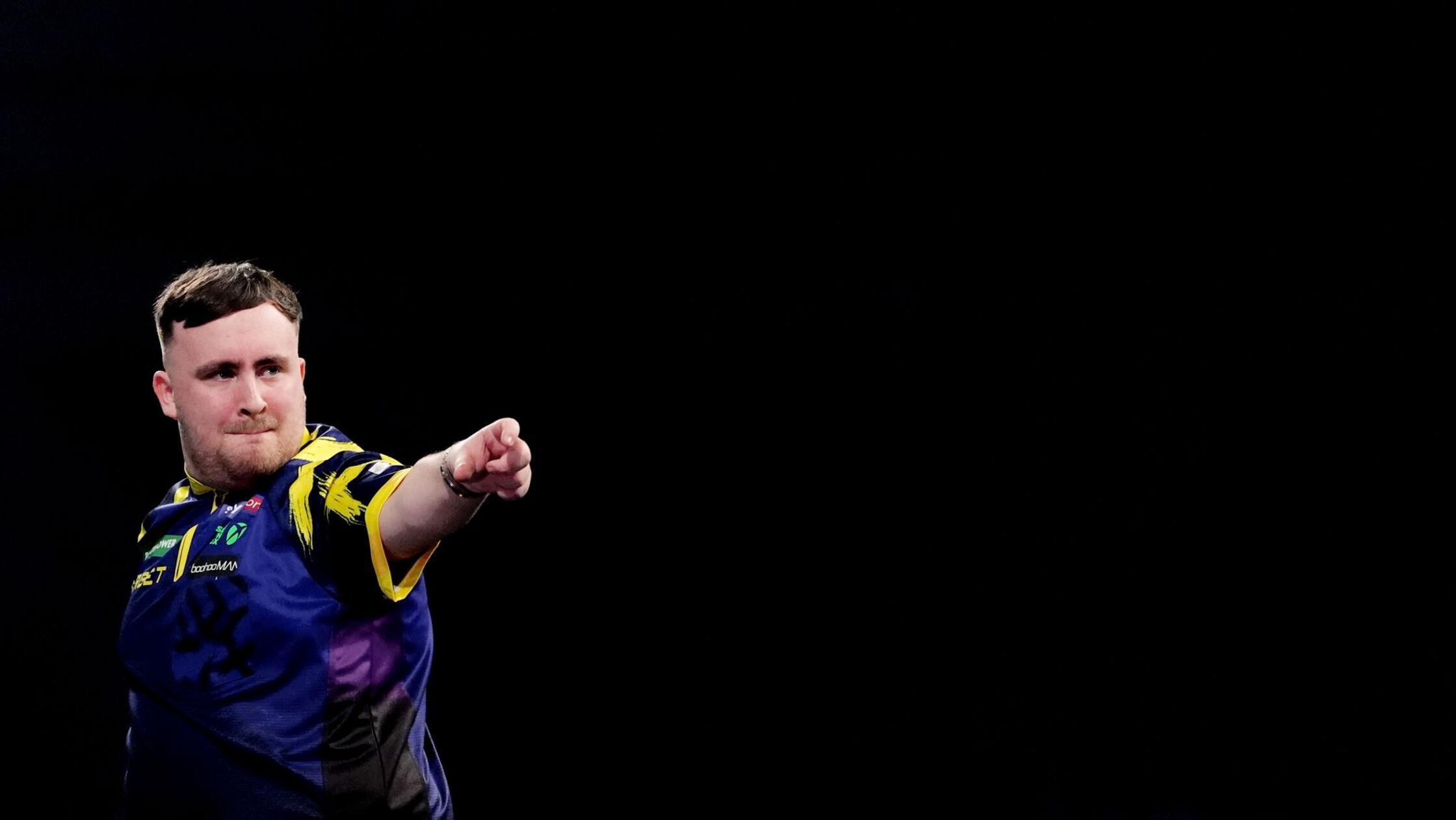 https://images.nordbayern.de/image/contentid/policy:1.14957121:1767420999/Darts_WM_Halbfinale_Littler_England__Searle_.jpg?%24p%24f%24h%24m%24w=ddae353&f=16%3A9&h=338&m=FIT&w=600