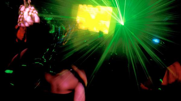 Clubbers on the dancefloor.