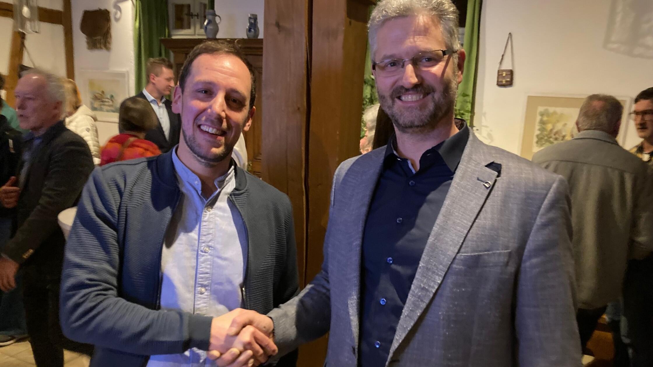 Hörr_Auinge_Handshake