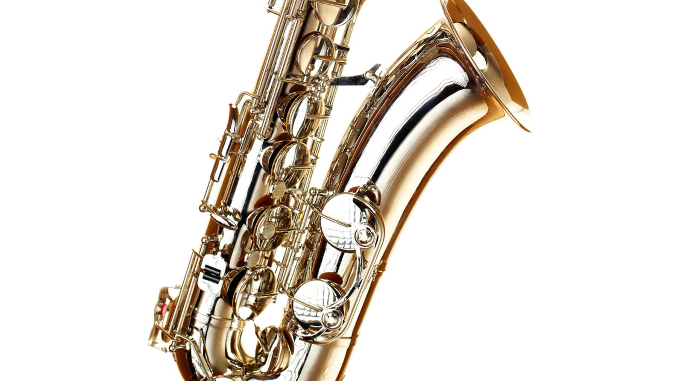 gold saxophote on white background