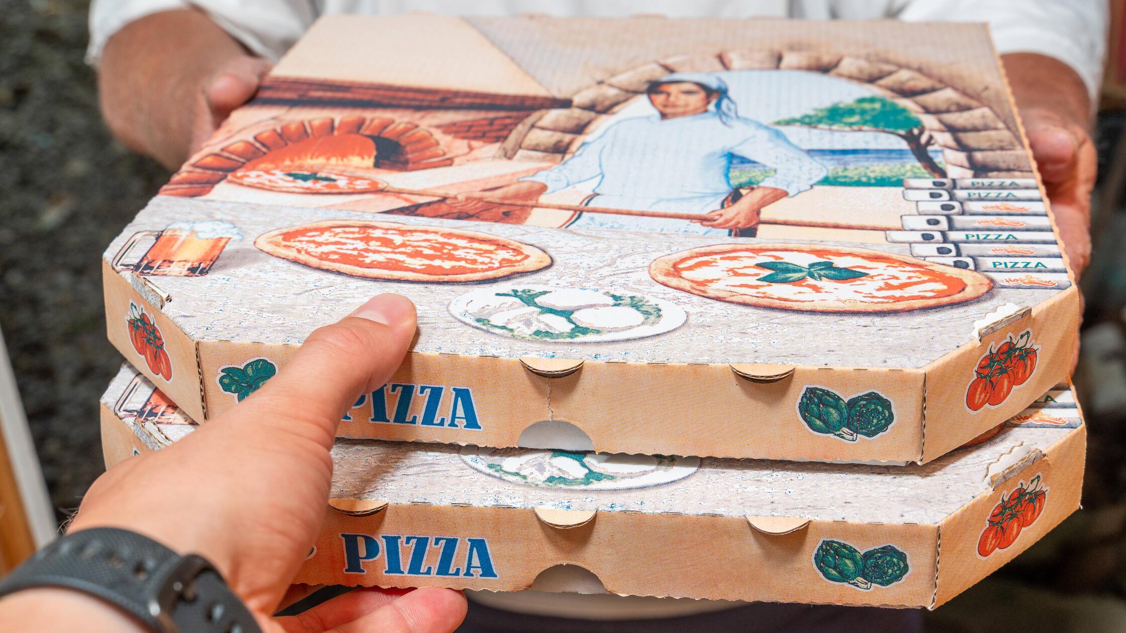 Bavaria, Germany - August 29, 2025: A pizza delive