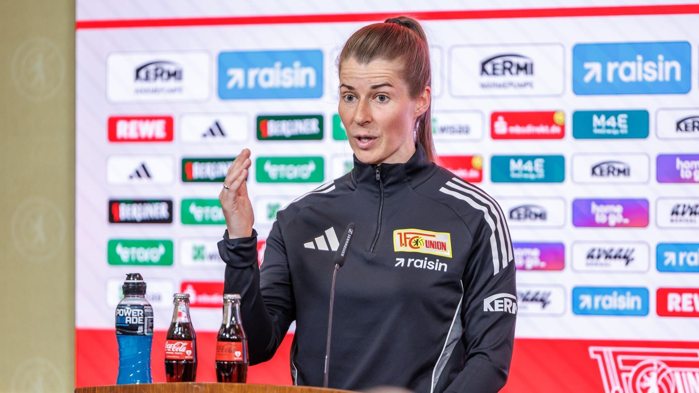 https://images.nordbayern.de/image/contentid/policy:1.15081160:1776407518/Fussball_Bundesliga_Maenner_1_FC_Union_Presseko.jpg?f=16%3A9&h=676&m=FIT&w=1200&%24p%24f%24h%24m%24w=b816a5e