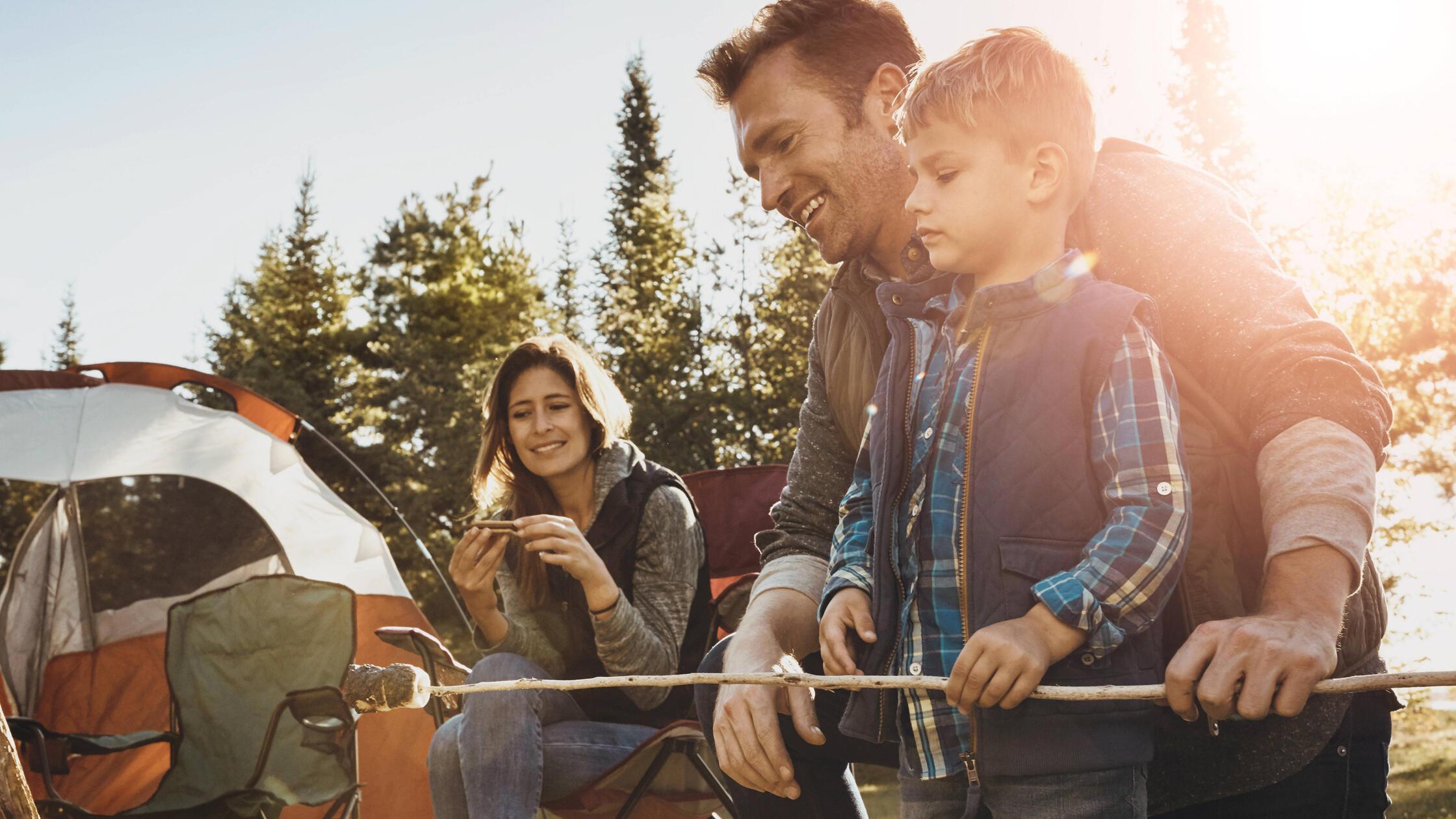 Family, camping and smores outdoor in nature for b