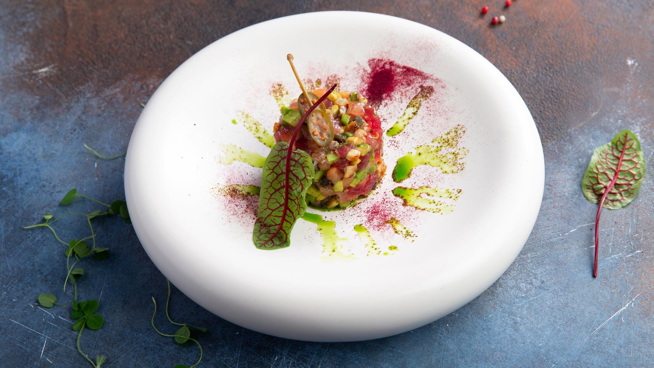 Vegetable tartare in a plate.