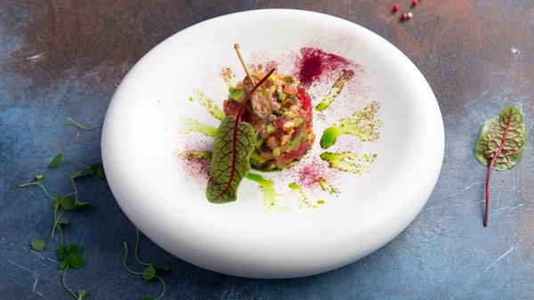 Vegetable tartare in a plate.