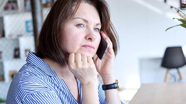 Germany - August 29, 2025: A woman is on the phone