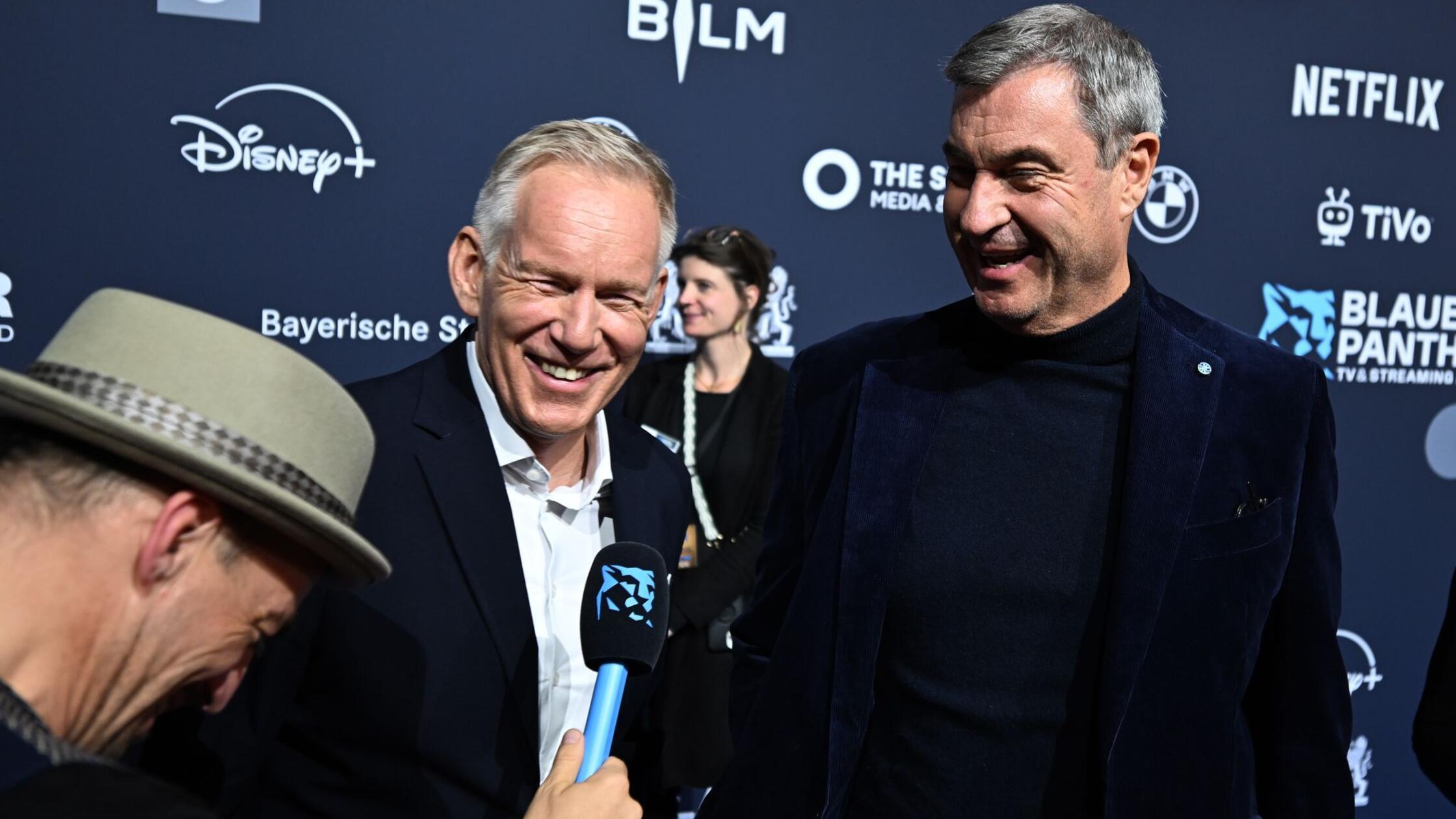 Der Moderator Johannes B. Kerner (M) und Markus Sö