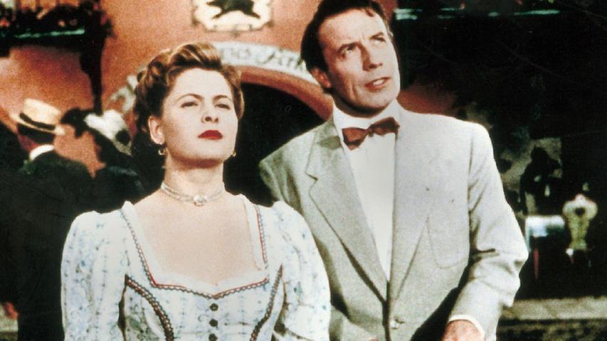Vor allem unkomplizierte und lebensfrohe Filme machten Johannes Heesters zum Star. Hier eine Szene aus dem Film "Im weißen Rößl" von 1950.