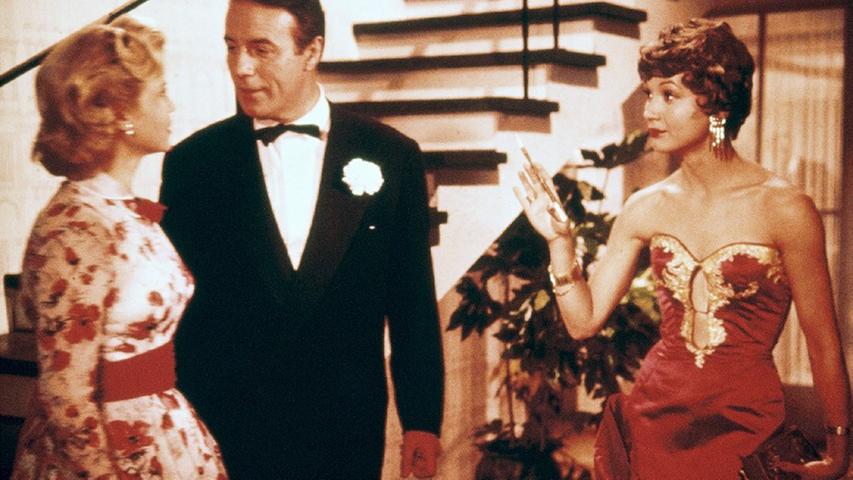 In Farbe bezauberte der schicke Heesters die Frauen - im Film ebenso wie im Kinosaal (Szene aus "Heute heiratet mein Mann").