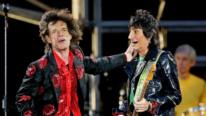 Mick Jagger (l) und Gitarrist Ron Wood (r) haben immer noch Spaß bei ihren Auftritten.