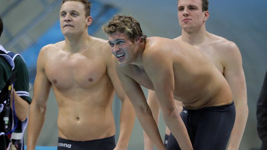 Deutschlands Schwimmer schwimmen derweil weiter hinterher: Paul Biedermann (rechts) & Co. gelang in der 4x 200-Meter-Freistil-Staffel nicht der erhoffte Edelmetall-Coup.