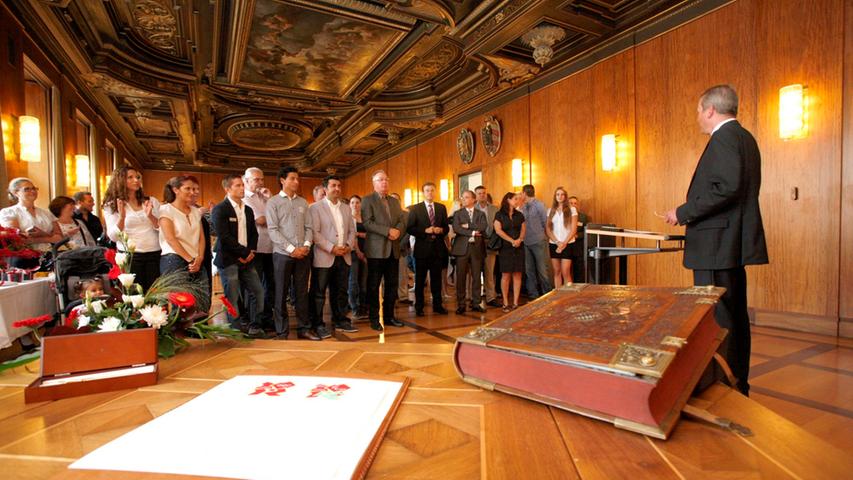 Nürnbergs OB Ulrich Maly würdigt die Leistungen der Nürnberger Olympioniken. Im Schönen Saal des Rathauses sind die Sportler mit ihren Familien eingeladen...