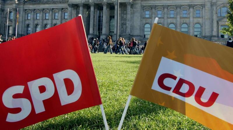 Spitzen von Union und SPD einigten sich am Mittwochmorgen auf einen Koalitionsvertrag. Spitzen von Union und SPD einigten sich am Mittwochmorgen auf einen Koalitionsvertrag.