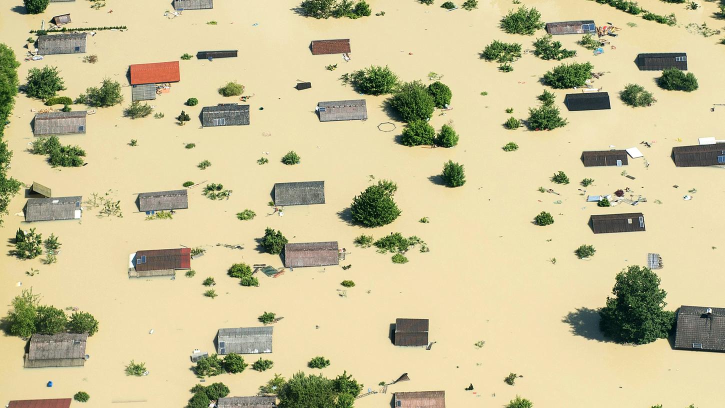 Dieses Foto, dass Deggendorf am 5. Juni 2013 nach einem Dammbruch zeigt, verdeutlicht, welch verheerenden Schaden Naturkatastrophen verursachen können.