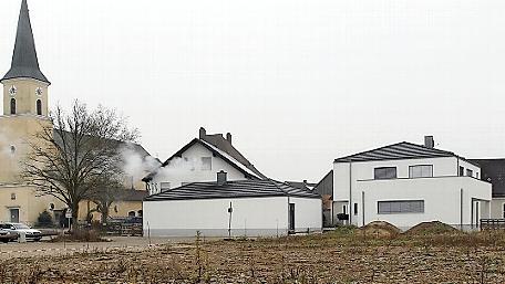 Auf dem Distler-Areal entstehen nun  Häuser mit günstigem Wohnraum u n d ein  Dorfplatz.