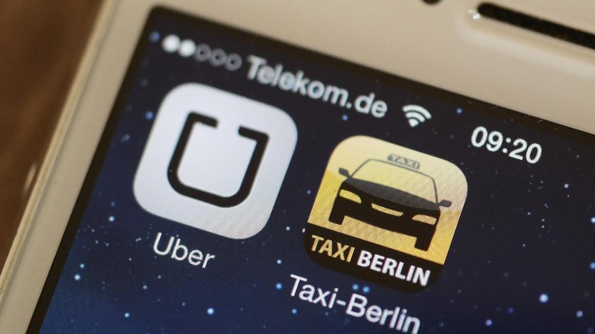 Harte Konkurrenz: Die Handy-Apps "Uber" und "Taxi Berlin".