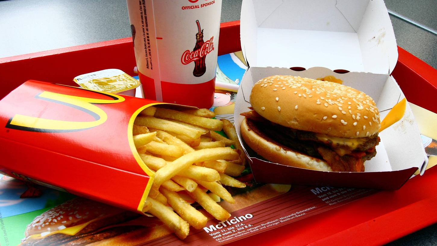 Burger, Pommes, Softdrink - der Klassiker bei McDonald's. Jetzt will der Fastfood-Riese auch liefern.