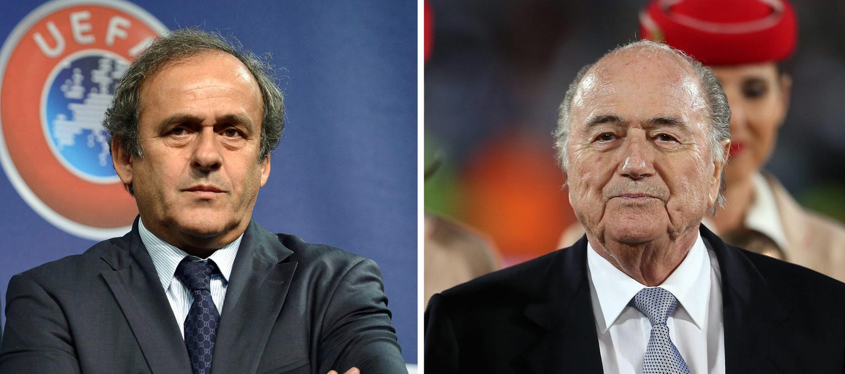 UEFA-Präsident Michel Platini (links) geht auf Distanz zu FIFA-Boss Sepp Blatter.