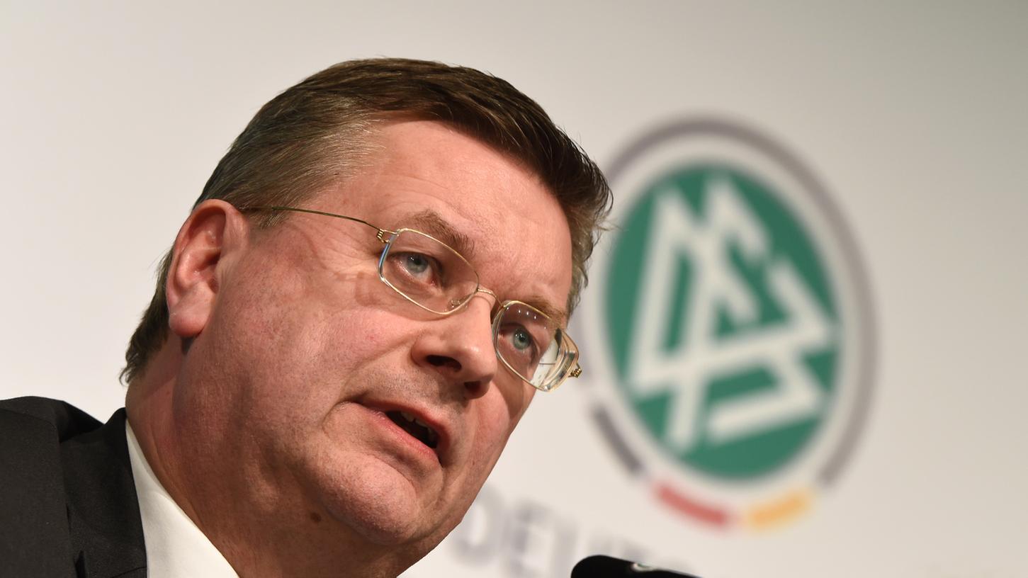 Ein deutsches Pokalfinale im Reich der Mitte? DFB-Präsident Reinhard Grindel ist von dieser Idee wenig begeistert.