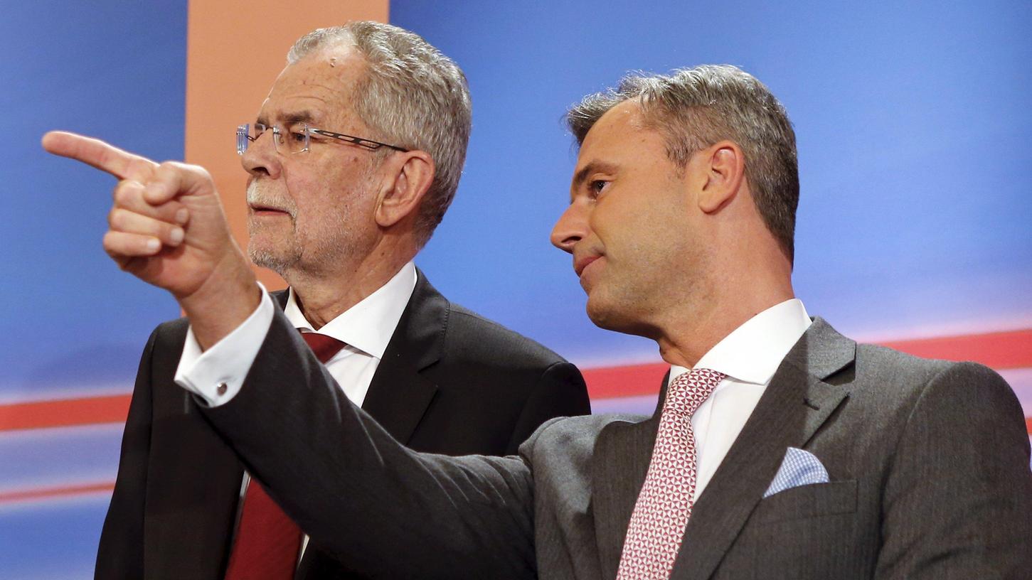Weist Norbert Hofer (rechts), Kandidat der FPÖ, den Weg? Mit Alexander Van der Bellen (links), dem Kandidaten der Grünen, ist er in der Stichwahl um das österreichische Präsidentenamt.