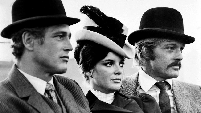 Weil sie einfach hinreißend sind, hier noch ein Foto von Paul Newman (li.) und Robert Redford aus "Zwei Banditen". In ihrer Mitte: die wunderbare Katharine Ross.