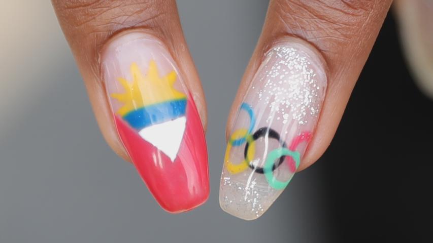...Hochspringerin Priscilla Frederick von Antigua und Barbuda: Sie hat sich ihre Nationalflagge und die Olympischen Ringe draufpinseln lassen.