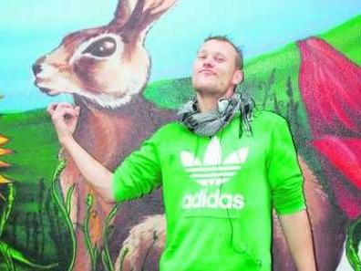 Putto Poised On A Globe