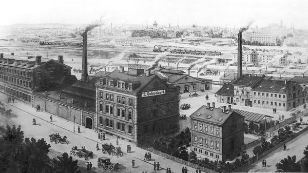 1903 fusionierte Siemens sein Starkstrom-Geschäft mit der Nürnberger Elektrizitäts AG, besser bekannt als "Schuckert". Seitdem ist der Konzern auch in Franken fest verwurzelt. Von früheren Arbeitergenerationen war noch lange zu hören: "Ich arbeite beim Schuckert." Sigmund Schuckert, der 1873 auf der Schwabeninsel beim Trödelmarkt zunächst Nähmaschinen reparierte, hatte sein Unternehmen 1885 gegründet.