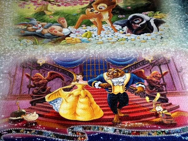 Das Riesenpuzzle zeigt Motive aus Disney-Filmen. Das Riesenpuzzle zeigt Motive aus Disney-Filmen.