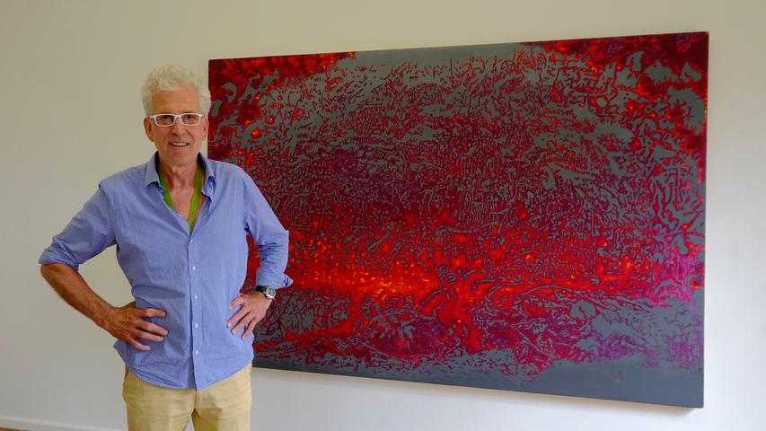 Günter Paule, "der Maler mit der Flex", leistet in seinem rot lodernden "Busch" filigranste Feinstarbeit. Dafür erhält auch er einen 3. Preis. 