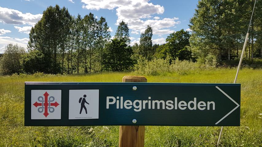 Der St. Olavspilgerweg ist mit diesem Zeichen bestens ausgeschildert.