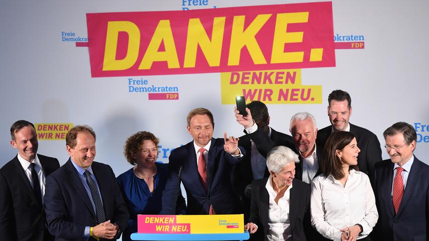 Gauland feixt, Merkel lächelt zufrieden: Der Wahltag in Bildern