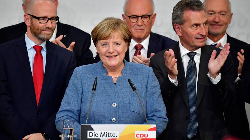 Gauland feixt, Merkel lächelt zufrieden: Der Wahltag in Bildern