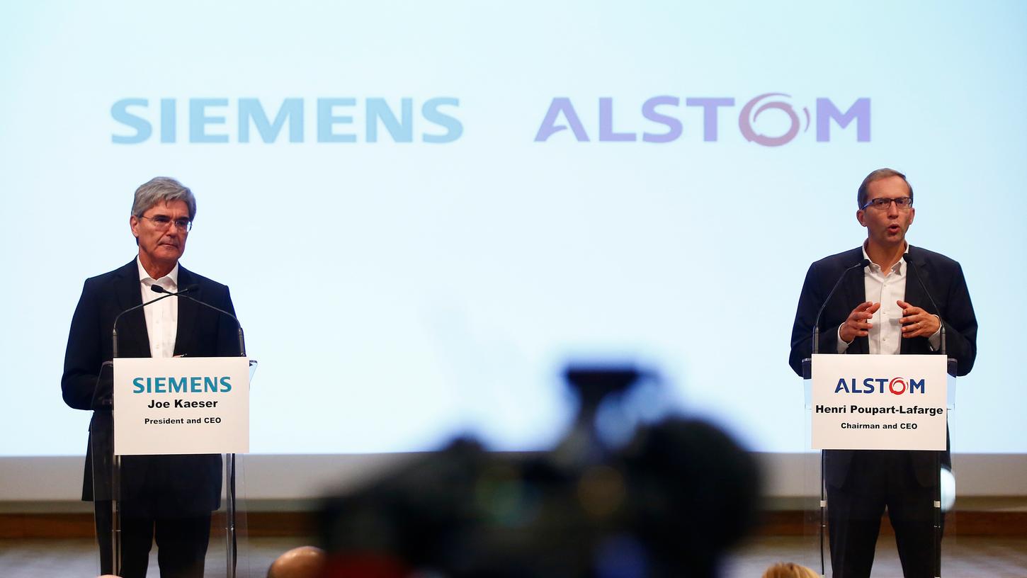 Siemens-Geschäftsführer Joe Kaeser und Alstom-Boss Henri Poupart-Lafarge machen künftig gemeinsame Sache - und gefährden damit laut Expertenmeinungen den Bahnstandort-Deutschland.