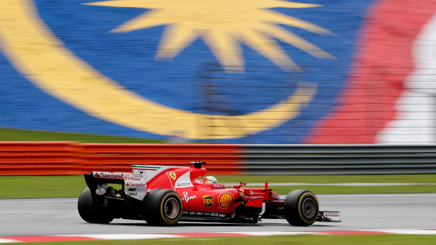 Ich muss nach vorne! Sebastian Vettel beeindruckte in Malaysia mit einer furiosen Aufholjagd.