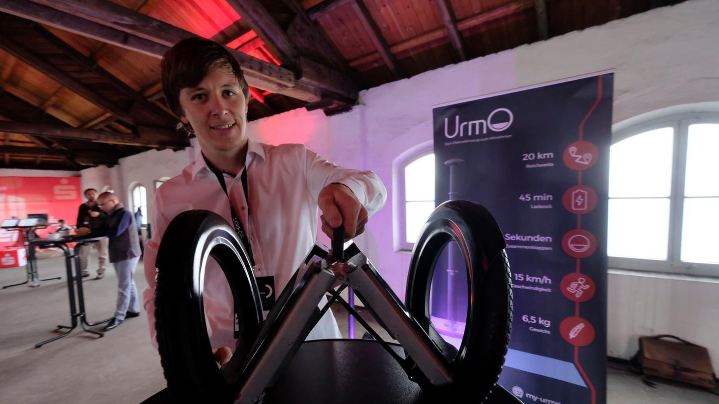Zwölf Start-Ups werden im neuen Gründerzentrum in Nürnberg ihr Zuhause finden - darunter auch Urmo, die ein Elektrofahrzeug zum Mitnehmen zum Mitnehmen entwickelt haben.