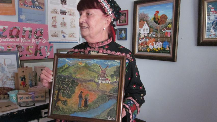 Die Künstlerin Zuzana Veresky lebt in dem vorwiegend slowakischen Dorf Kovacica, dessen Einwohner sich seit Generationen der naiven Malerei widmen.