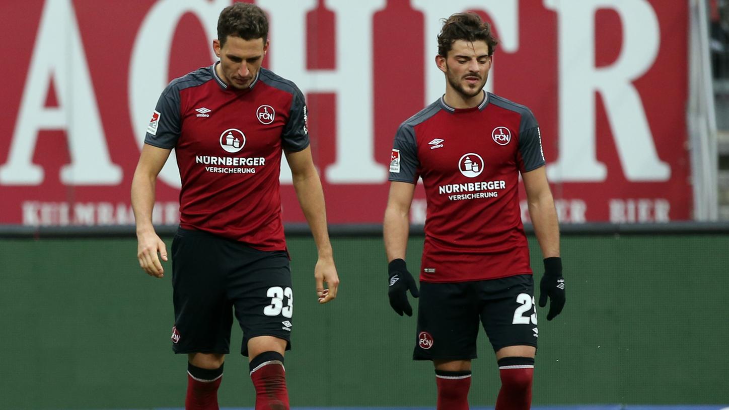 Enttäuschung bei Georg Margreitter (li.) und Tim Leibold: Gegen Holstein Kiel gab der Club eine Zwei-Tore-Führung aus der Hand.