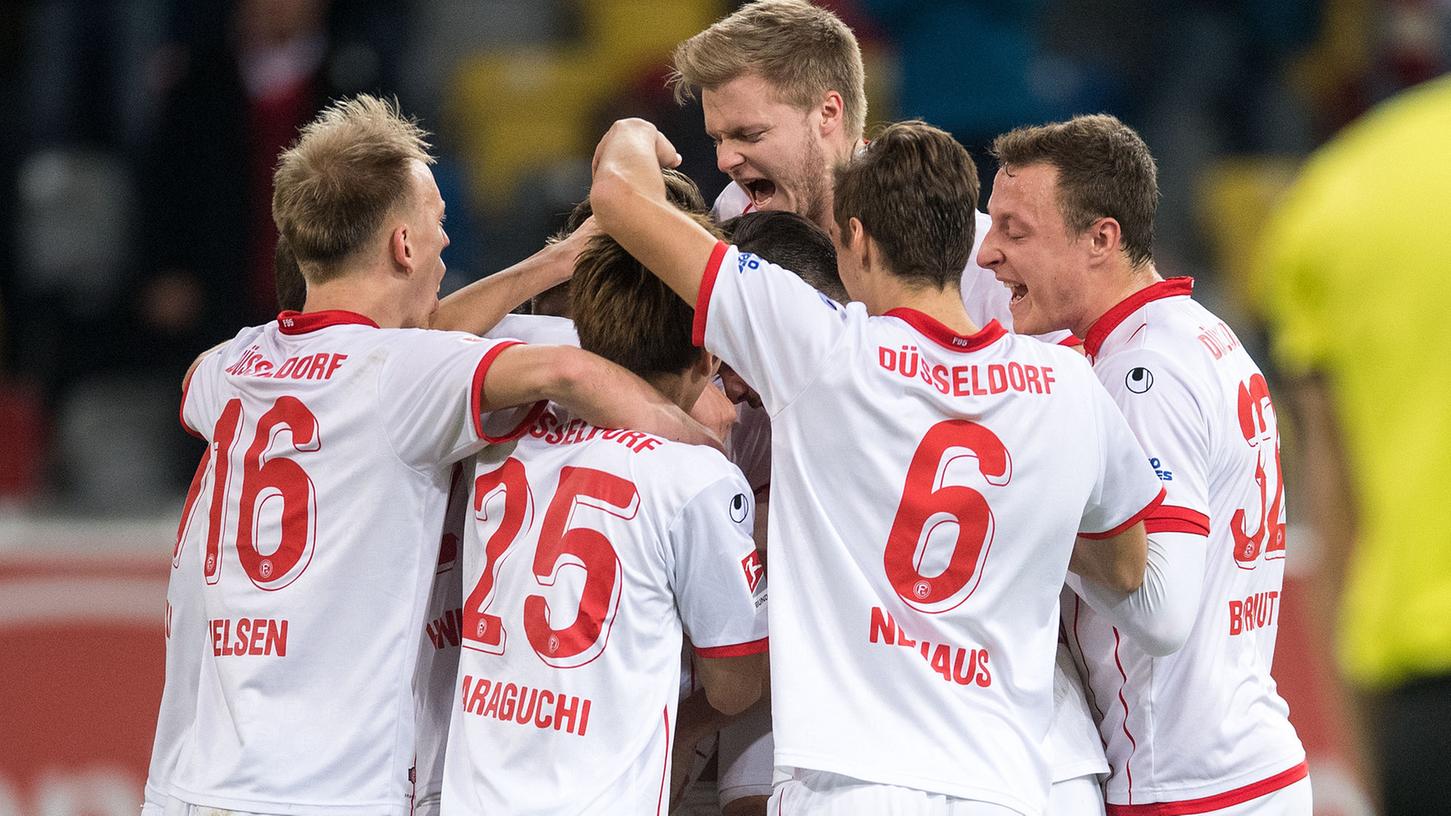 Fortuna Düsseldorf baut dank eines 2:1-Erfolgs gegen Erzgebirge Aue die Tabellenführung aus.